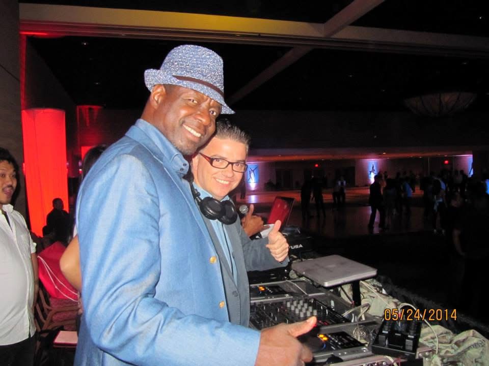 Dr. Salsa with a fellow DJ at the decks during the 2014 Los Angeles Salsa Fest.