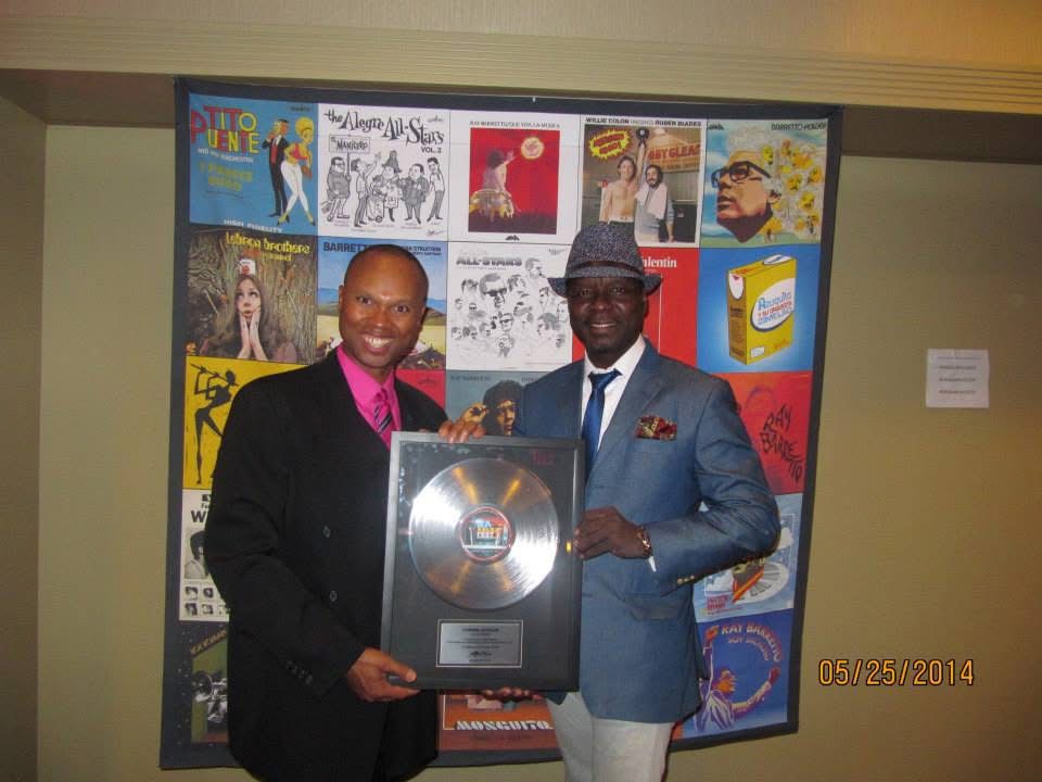 Dr. Salsa receiving a commemorative music award during the 2014 Los Angeles Salsa Fest.