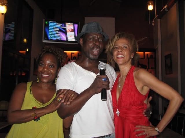Friends and performers with a microphone at the SALSA CONCEPT® evening at Elefin, Bangkok.